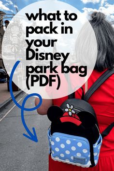 a woman with grey hair wearing a red dress and carrying a mickey mouse backpack on her back