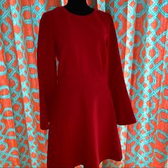 Beautiful Bright Red Dress With Long Sleeves In A Size 10. Red Long Sleeve Lined Dress, Red A-line Mini Dress With Lining, Red A-line Mini Dress Lined, Red Mini Dress For Winter Workwear, Red Mini Dress For Work In Winter, Red A-line Fit And Flare Mini Dress, Red Fit And Flare A-line Mini Dress, Red Chic Fit And Flare Mini Dress, Formal Red Fit And Flare Mini Dress