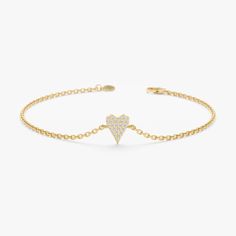 Add a touch of timeless love and sophistication to your wrist with the Elongated Diamond Heart Bracelet. This beautiful piece showcases a delicate 14k yellow gold chain adorned with a stunning elongated heart pendant. The center of the heart features sparkling pave diamonds, meticulously set to create a brilliant display of shimmer. - Handmade - Solid Gold - Natural Diamond  - G Color, SI Quality Diamonds - Total Diamond Carat Weight: 0.08 ctw - Dimensions of the Heart: 5 x 7 mm 🛠 Your Sarah Elise piece is handcrafted with care! Ready-to-ship items go out within 3 business days. Made-to-order pieces typically take 7-10 business days to create. If you need something sooner, please contact us - we'll see if we can make it happen! For estimated shipping dates and tracking, check your Etsy ac Memory Ring, Bracelet Cute, Timeless Love, Bracelet Dainty, Bracelets Gold Diamond, Beautiful Gift Wrapping, Minimalist Bracelet, Initial Jewelry, Diamond Carat