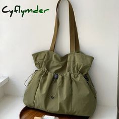 45428401570009 Trendy Tote Shoulder Bag For Outdoor Activities, Green Large Capacity Nylon Shoulder Bag, Large Capacity Green Nylon Shoulder Bag, Outdoor Tote Bags, Trendy Nylon Shoulder Bag For Outdoor Activities, Casual Khaki Nylon Shoulder Bag, Large Capacity Shoulder Bag For Summer Outdoor Activities, Outdoor Nylon Shoulder Bag With Large Capacity, Trendy Nylon Shoulder Bag For Outdoor