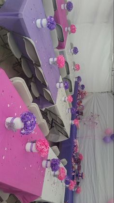 purple and white chairs with flowers on them