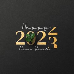 a black and gold new year's card with a plant in the middle that says happy new year