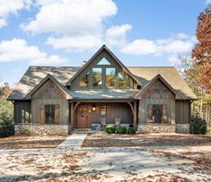 a large house with lots of windows in the front