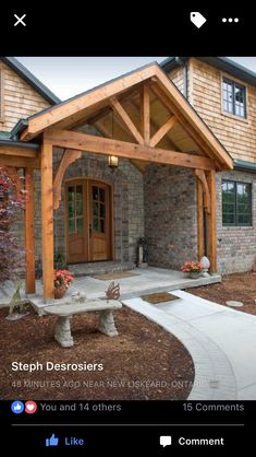 the front entrance to a house with a stone walkway