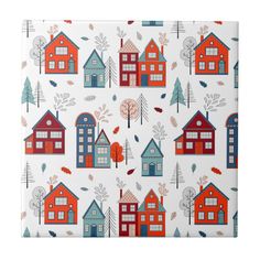 a blue and red house pattern on a white background with trees, leaves and houses