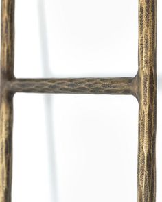 a close up of a metal frame on a white background with no people in it