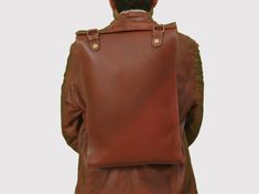 Simple, elegant and minimalist leather backpack that is designed to accommodate your daily belongings. your daily go to companion for college, gym or evening walk-Rugged and vintage looks of full grain leather. treat for men and women who love sophistication! Features: - Soft Cotton Interior Lining - Hidden Back Pocket - Padded Laptop Compartment - Smooth & Sturdy YKK Zipper - Wear-Proof and Durable Material & Dimensions: - Made of High-Quality Full Grain Leather - Approx. Dimensions in cm: 29x1 Everyday Rectangular Leather Backpack With Smooth Grain, Modern Brown Leather Backpack For Daily Use, Everyday Leather Backpack With Smooth Grain, Brown Leather Backpack For Daily Use, Daily Use Leather Backpack With Smooth Grain, Daily Leather Backpack, Minimalist Rectangular Leather Backpack, Modern Smooth Grain Leather Rectangular Backpack, Modern Rectangular Backpack With Smooth Grain