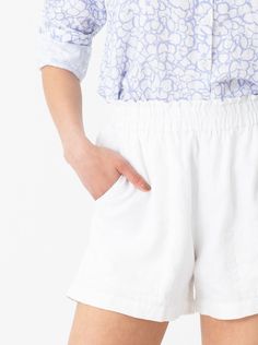 The Summer Short is ready for all your summer adventures. Made from our lightweight Linen, these shorts are easy to dress up or down by swapping out a fun sandal with a sneaker. Perfect for on the go with pockets to carry your phone and a full elastic waist for all day comfort. 3.5" inseam White Bermuda Shorts With Built-in Shorts For Vacation, Casual Vacation Shorts With Side Pockets, Comfortable Shorts With Elastic Waistband For Summer, Casual Shorts With Pockets For Warm Weather, Travel Shorts With Built-in Liner For Summer, Comfortable Spring Vacation Shorts, White Bermuda Shorts For Summer Vacation, Spring Beach Shorts With Side Pockets, Casual Beach Season Shorts With Side Pockets