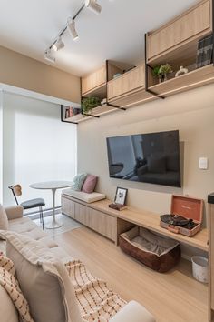 the living room is clean and ready for us to use as an entertainment center or dining area