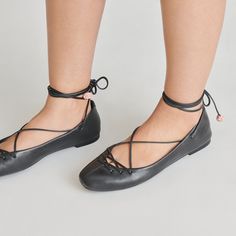 From our For Love & Lemons collab, BEATE is everything we love in a ballet flat—timeless, understated, versatile—and more. Topping her classic silhouette is a lace-up design for maximum feminine impact. Leather Upper Synthetic Outsole Synthetic Lining Leather Sock Imported Elegant Black Ballet Flats For Everyday Wear, Elegant Black Ballet Flats For Everyday, Black Everyday Ballet Flats, Everyday Black Ballet Flats, Black Leather Ballet Flats With Leather Sole, Everyday Black Leather Ballet Flats, Chic Lace-up Leather Ballet Flats, Elegant Black Ballet Flats With Textured Sole, Black Leather-lined Ballet Flats