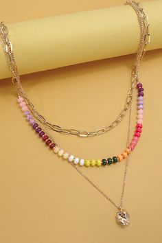 Double Layer Multi-Beaded Bean Charm Necklace, this stylish necklace features two layers of delicate chains adorned with an array of colorful beads and charming bean accents. The combination of vibrant beads and unique bean charms creates a dynamic and eye-catching design. Perfect for adding a pop of color to any outfit. Product Details:length: 15", 17", 18"charm: .75"ext: 3" Ball Chain Extclasp: Lobster Clawmetal finish:Gold Platedproduct: Lead & Nickel Compliantanti-tarnish: Double E-coating Layered Necklace | Gold Necklace | Gold | Rhinestones | Simple | Pendent | Charm | Cross | Stacking Necklaces | Mom | Glass bead Necklace | Stacking Necklaces, Layered Chain Necklace, Stacked Necklaces, Sunglass Chain, Stylish Necklace, Layered Chains, Gold Charm Necklace, Square Pendant, Gold Necklace Layered