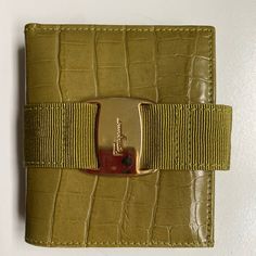 Nwot Salvatore Ferragamo Vala Wallet. Light Olive Green Color. 2 Fold. 3 Card Slots And A Coin Holder. Green Designer Wallets With Interior Card Slots, Designer Green Wallet With Interior Card Slots, Designer Green Wallets With Interior Card Slots, Green Luxury Wallets With Interior Card Slots, Luxury Green Wallets With Interior Card Slots, Green Luxury Wallet With Interior Card Slots, Luxury Green Wallet With Interior Card Slots, Luxury Green Wallets With Card Slots, Designer Leather Travel Wallet