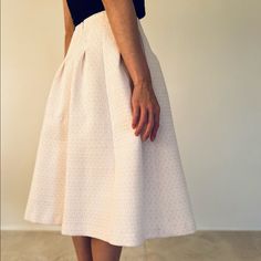 Pale Pink White Textured, 100% Polyester , Xs, Made In London Feminine Fitted A-line Skirt, Feminine Midi Skirt, Knee-length Pleated Skirt, Feminine Relaxed A-line Skirt, Feminine Fitted Full Skirt, Chic Pink A-line Pleated Skirt, Feminine Full Pleated Skirt, Feminine Knee-length Pleated Skirt, Feminine Fitted Midi Pleated Skirt