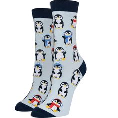 Penguin socks for women. Featuring cute penguins dressed up in hats and scarves for cold weather. These women's penguin socks are a great way to add a pop of color to any outfit. Casual Socks As Gift For Fall, Casual Socks As A Gift For Fall, Casual Socks For Fall Gift, Casual Socks For Fall, Casual Winter Socks For Stocking Stuffers, Novelty Winter Socks For Gifts, Novelty Winter Socks As Gift, Novelty Socks For Winter Gift, Novelty Winter Socks For Gift