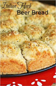 italian herb beer bread on a red and white tablecloth with the words, italian herb beer bread