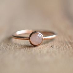 Best Seller! 14k Rose Gold Filled Ring with 5mm genuine rose quartz. Stackable ring. This is my most popular gemstone ring. The ring is 14k rose gold filled so it is very durable. It will not tarnish if it gets wet and will hold the color. Other gemstones are also available: https://www.etsy.com/shop/LyndyLouDesigns?ref=listing-shop-header-item-count&search_query=rose+gold+gemstone+rings Gemstones: Garnet Amethyst Aquamarine Green Onyx Moonstone Mother of Pearl Lab Ruby Peridot Sapphire Lapi Gold Ring Stacking, Rose Gold Quartz, Easter Sale, Gold Gemstone Ring, Rose Quartz Ring, Gold Filled Ring, Ring Stacking, Ring Rose Gold, Gifts For My Wife