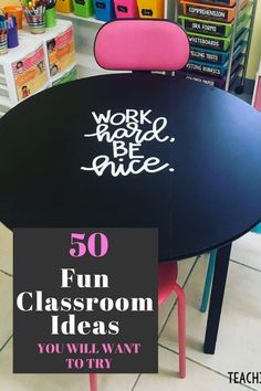 a classroom table with the words work hard, be nice written on it in black and pink