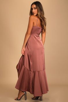 Sparks are sure to fly whenever the Lulus Enchanted Moments Mauve Pink Satin Ruffled High-Low Dress is around! Sleek woven satin shapes a darted bodice, adjustable spaghetti straps, and a high waist. Ruffle-trimmed skirt has an overlapping high-low silhouette, perfect for showing off your favorite heels. Hidden back zipper/clasp. Fit: This garment fits true to size. Length: Ankle length. Size medium measures 46.25" from top to bottom. Bust: Great for any cup size. Waist: Fitted - very fitted at Mauve Pink Dress, Satin Ruffle Dress, Surplice Dress, Ruffled Dress, Mauve Pink, Dress Satin, Pink Satin, Cup Size, Ankle Length