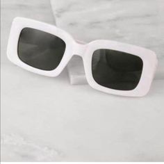 White Retro Sunglasses White Retro Sunglasses, Chic White Square Frame Sunglasses, White Square Frame Sunglasses For Summer, White Square Frame Sunglasses For Beach, White Rectangular Sunglasses For Summer, White Sunglasses With Gradient Lenses For Beach, Modern White Sunglasses For Vacation, Chic White Sunglasses For Spring, White Sunglasses For Summer Beach