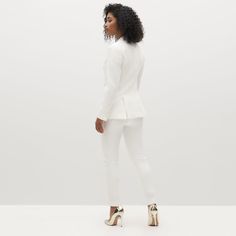 Women's White Tuxedo | SuitShop Elegant Fitted Spring Tuxedo, White Tuxedo Style Evening Outerwear, White Notch Lapel Outerwear For Party, White Blazer With Lapel Collar For Evening, White Tuxedo-style Party Outerwear, White Tuxedo Style Party Outerwear, White Evening Suits With Lapel Collar, Elegant Spring Suits With Pressed Crease, Elegant Spring Blazer With Pressed Crease