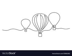 three hot air balloons flying in the sky