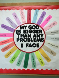 a bulletin board with the words my god is bigger than any problems i face