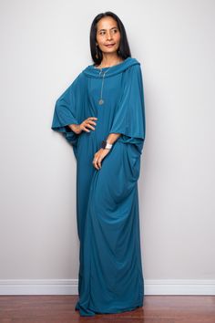 "Kaftan Dress, Teal Maxi Dress, Long boho dress, Loose fit dress PRODUCT SIZE : One Size Fits Most * Chest : free up to 60\" * Waist : free up to 60\" * Hips : free up to 60\" * Circumference bottom hem : 45\" * Length : 55\" * Sleeve length : 23\" MATERIAL * ITY Polyester MODEL : * Model chest : 32\", Height 160 cm (5.2) without high heel * Accessories excluded Produced by NUICHAN IMPORTANT NOTE *Please note that colours shown on your monitor may vary from the actual colour of the fabric. If yo Bohemian Batwing Sleeve Spring Dresses, Bohemian Flowy Tunic With Batwing Sleeves, Spring Bohemian Batwing Sleeve Dresses, Spring Bohemian Dress With Batwing Sleeves, Free Size Dress With Batwing Sleeves, Free Size Batwing Sleeve Dress, Flowy Maxi Dress With Batwing Sleeves, Long Boho Dress, Maxi Frocks