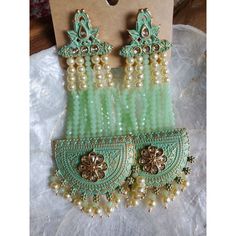 Beautiful Long Indian Style Earrings Beutiful Meenakari And Pearl Work Heavy Design But Light Weight Suitable For Any Dress And Occasions 4 1/5 Inches Long Have So Many Other Colors Pls Check My Listings For More Color Options Traditional Green Beaded Earrings For Party, Traditional Green Beaded Party Earrings, Green Dangle Chandbalis For Festivals, Festive Beaded Earrings With Dangling Beads As Gift, Green Dangle Chandbalis With Latkans, Festive Green Chandbalis Dangle, Fusion Style Green Chandelier Drop Earrings, Green Fusion Style Drop Chandelier Earrings, Festive Green Dangle Chandelier Earrings