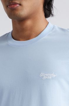 The brand's name and its founding date are embroidered at the chest of this slim-fitting T-shirt cut from soft cotton jersey. 28" length (size medium) Crewneck Short sleeves 100% cotton Dry clean Made in Portugal Designer Clothing Blue Short Sleeve T-shirt With Logo, Blue Crew Neck T-shirt With Logo Detail, Blue Short Sleeve Tops With Logo Detail, Blue Short Sleeve Top With Logo Detail, Classic Blue T-shirt With Logo Print, Blue Crew Neck Top With Logo, Light Blue Crew Neck T-shirt With Logo, Logo Fitted Crew Neck Top, Light Blue Logo Print Crew Neck T-shirt