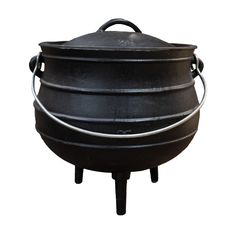 a large black pot sitting on top of a metal stand