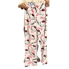 Experience the comfort of our Hello Kitty Comfortable Flannel Pajamas Pant, designed to provide a cozy and playful addition to your loungewear collection. These pants feature a vibrant character print set against a soft background, offering both style and comfort for your perfect days at home. Features: Material: Crafted from soft fleece material that provides warmth and a gentle touch against the body. Special Features: Equipped with a comfortable elastic waist-band and a roomy fit for ease of Casual Hello Kitty Print Sleepwear, Casual Hello Kitty Print Sleepwear Pants, Casual Hello Kitty Long Pants Sleepwear, Cute Hello Kitty Print Loungewear Pants, Cute Hello Kitty Loungewear Pants, Hello Kitty Print Long Pants Sleepwear For Loungewear, Playful White Pants For Loungewear, Hello Kitty Print Sleepwear For Pajama Party, Soft Background