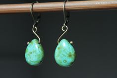 Turquoise Green Earrings Dangle Earrings Drop Earrings Czech Glass Earrings Small Earrings Birthday Gift for her Gift for women Color : Turquoise Green Picasso Beads - Czech Glass Beads - 16x12mm Teardrop Finish : Antiqued Brass Size : Approx 1,5 inches including the antiqued brass lever backs Ear wires : Antiqued brass lever backs Available in deep red : https://www.etsy.com/listing/485739803/red-earrings-czech-glass-drop-earrings?ref=shop_home_active_19 Glass Earrings section : https://www.ets Turquoise Jewelry Earrings, Glass Drop Earrings, Color Turquoise, Turquoise Green, Red Earrings, Earrings Drop, Green Earrings, Birthday Gift For Her, Small Earrings