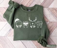 Cute Christmas Teeth Dental Sweatshirt, Dental Hygiene Team Merry Christmas Shirts, Holiday Tooth Dentist Sweater, Winter Dental Office Christmas Shirt, Christmas Dentist Teeth Shirt, Christmas Gift for Dentistry School Student ✧ SIZING ✧ ⋒ Please check our size chart before placing an order. ⋒ If you want an oversized look, pick a sweatshirt that is 2 sizes larger than your usual size. ✧ IMPORTANT NOTE: We try to depict all shirt and design colors as close to the original as possible but depend Christmas Dental Shirt, Christmas Teeth Dental, Dental T Shirts, Dental Christmas Shirt, Dental Gifts Ideas, Dental Christmas Shirts, Dental Sweatshirts, Funny Dental Shirts, Dental Hygiene Shirt