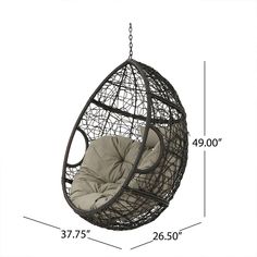 a hanging egg chair is shown with measurements for the seat and back cushions on it