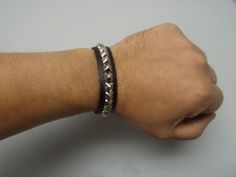 "High Quality Premium Full Grain Leather Handcrafted Bracelet available with 1, 2, 3, 4 and 5 rows of studs The Leather is nice and soft, it will get buttery and more subtle with wear. The studs/spikes are small pyramid studs. The studs measure 1/4\" by 1/4\" square. The studs are pyramid shaped. The Pyramid studs have a nice luster to them. These studs are plated in a nice nickel plating. The studs look like silver/Chrome This wristband/Bracelet is basically a one-size fits all. it will fit mos Adjustable Silver Leather Bracelet With Wrist Strap, Adjustable Silver Wristband With Strap, Silver Adjustable Leather Bracelet With Wrist Strap, Studs And Spikes, Wristband Bracelet, Nickel Plating, Silver Chrome, Handcrafted Bracelets, Square Stud