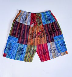 Cute boho hippie patchwork shorts unisex Multicolored and multipatched Pockets on both side Brand new 100% cotton handmade Drawstring with elastic waistband *patch shorts one size only Fits small,medium,large and XL *S, M,L and xl available in other shorts Fast and free delivery 1-3 days We ship same day #boho #shorts #hippie #patch #patchwork Cheap Blue Patchwork Shorts, Cheap Multicolor Cotton Shorts, Multicolor Hippie Shorts For Vacation, Hippie Multicolor Beach Shorts, Hippie Multicolor Shorts For Beach, Hippie Multicolor Shorts For The Beach, Casual Multicolor Festival Shorts, Casual Multicolor Shorts For Festival, Casual Patchwork Shorts For Beach