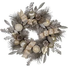 a christmas wreath with silver and gold decorations on top of white paper flowers, pine cones and leaves