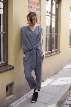 This womens overalls is something fantastic! Unusual and trendy design combined with natural linen material is making it a best summer choice. Jumpsuit has two pockets, shoulder area can be regulated with linen drawstrings. In the back there is a zipper for comfy fastening. You will never see anything similar in other shops. It is handmade piece of clothing, that will be tailored according to your measurements and will fit you the best and most complimented way! Your will love the quality and de Casual Linen Jumpsuits And Rompers For Work, Casual Linen Jumpsuits And Rompers For Loungewear, Linen V-neck Jumpsuits And Rompers For Spring, Spring Linen Jumpsuit With V-neck, Spring Linen V-neck Jumpsuit, Linen Jumpsuits And Rompers For Loungewear, Linen Jumpsuits And Rompers With Pockets, Relaxed Fit Linen Jumpsuit With V-neck, Spring Linen Overalls With Relaxed Fit