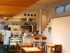 the restaurant is clean and ready for customers to eat their meal in it's open kitchen