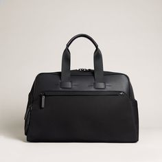 Embark Duffle | Lightweight Waterproof Recycled Fabric | Troubadour Functional Leather Duffle Bag, Black Functional Laptop Bag For Business Trips, Functional Black Laptop Bag For Business Trips, Functional Laptop Bag With Zipper For Business Trips, Functional Bags With Leather Trim For Business Trips, Business Nylon Travel Bag, Functional Nylon Travel Bag For Business, Functional Travel Bag With Leather Trim For Business Trips, Functional Nylon Business Travel Bag