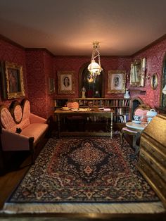 a living room filled with furniture and paintings