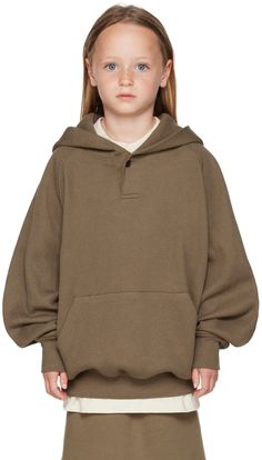 Long sleeve waffle knit cotton-blend hoodie in brown. Rubberized logo patch at hood. · Single-button placket · Kangaroo pocket · Rib knit hem and cuffs · Raglan sleeves · Hand wash Model measures 46.75”/ 122 cm tall and wears size S. Please note that this item may not be shipped within the EU. Supplier color: Wood Size: child's height XXS: 36-41 / 91.5-104 cm XS: 41-44.5 / 104-113 cm S: 44.5-48.5 / 113-123 cm M: 48.5-53 / 123-134.5 cm L: 53-58 / 134.5-147.5 cm XL: 58-62 / 147.3-157.5 cm XXL: 63-67 / 157.5-170.2 cm Hooded Waffle Knit Loungewear Hoodie, Waffle Knit Hoodie For Loungewear, Casual Waffle Knit Hoodie, Cozy Brown Sweatshirt With Ribbed Cuffs, Casual Waffle Knit Hooded Hoodie, Fall Hoodie With Ribbed Collar, Khaki Long Sleeve Hoodie With Ribbed Cuffs, Fall Waffle Knit Long Sleeve Hoodie, Cotton Waffle Knit Hooded Hoodie