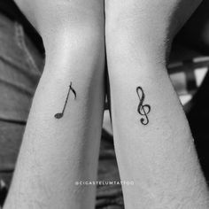 two tattoos with musical notes on their legs