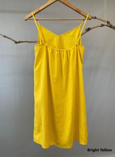 "Nothing welcomes the hot weather more than linen. This simple linen slip dress is a must have and can be more playful if layered. -100% linen construction -V neck -Slightly A-line shaped -Adjustable spaghetti straps -Above the knee -Slip on overhead -Listing colors: Blush, Natural, and White Please provide your shoulder width, full bust measurement ( measured around the fullest part) and your height along with your order in the note to seller box. Don't see your size? Please message us for cust Linen Mini Dress For Daywear, Summer Cotton Suspender Dress Mini Length, Summer Cotton Mini Suspender Dress, Summer Cotton Suspender Mini Dress, Cotton Suspender Dress For Summer Vacation, Spring Linen Mini Dress With Straight Neckline, Summer Sundress Mini Dress With Camisole Shape, Linen Mini Dress With Straight Neckline For Spring, Summer Sundress With Camisole Shape