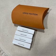 New, Never Used Includes 4 Perfumes Samples, Each One 0.06oz 4 Different Scents Fleur Du Desert Le Jour Se Leve Attrape-Reves California Dream They Will Come Inside The Little Box Shown Lv Perfume, Louis Vuitton Orange, Sample Display, Perfume Sample, Different Scents, Perfume Samples, New Color, Scents, Louis Vuitton