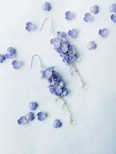 *Free shipping on orders more than $35 in U.S. Territories ⭐Stunning delicate wisteria drop earrings. Perfect gift idea for garden lovers or a treat for yourself Light weight and comfortable to wear everyday. They are very cute and romantic, will easily blend with your style. 📌DETAILS *Quantity: 1 pair *Measurements:  Length：9cm (3.54"), Drop：7.5 cm (2.95"), Width 2 cm (0.78") *Materials: bronze with gold plated(nickel free)/ acrylic/ glass beads 📌NOTES Colors may vary slightly due to different computer monitor settings. Substances like oil, nail polish, nail polish remover, chlorine, and perfume may react with metal/plated jewelry and cause it to tarnish. This is also true for sweat, so make sure you remove your gold plated jewelry when you exercise or doing anything requiring heavy wor Wisteria Earrings, Fairycore Nature, Earrings Fairycore, Flower Earrings Dangle, Lover Earrings, Earrings Summer, Summer Earrings, Earrings Flower, Summer Earring