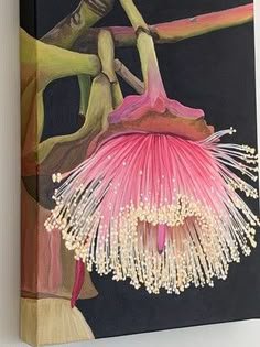 a painting of a pink flower on a black background with white beads hanging from it's center