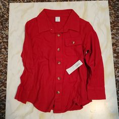 Boys 3t Red Button Down Long Sleeved Shirt. New With Tags. Red Shirt With Snap Buttons For Fall, Red Fall Shirt With Snap Buttons, Fall Red Shirt With Snap Buttons, Red Top With Snap Buttons For Fall, Red Snap Button Top For Fall, Red Fall Top With Snap Buttons, Red Button-up Top With Pockets, Red Cotton Tops With Snap Buttons, Red Button-up Top With Buttons