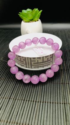 KUNZITE Round Bracelet SHAPE :- ROUND  STRECH CORD BRACELET We take order work as well. Feel free to contact for purchasing goods in bulk. We are Wholesaler & manufacturers of semi-precious & precious gemstones, Loose Gemstones Beads, Cabochons. Measurements & weight are close approximations Round Amethyst Bracelets With 8mm Beads, Amethyst Bracelets With 8mm Beads, Amethyst Beaded Bracelets With 8mm Beads, Round Crystal Bracelet With Natural Stones, Round Bracelet, Cord Bracelet, Cord Bracelets, Precious Gemstones, Gift Registry