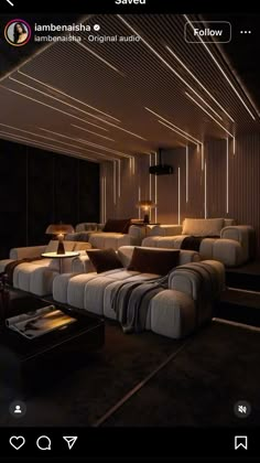 an image of a living room setting with couches and lamps on the ceiling,